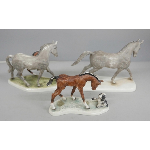 2060 - A set of three Goebel horse figures, one with a dog