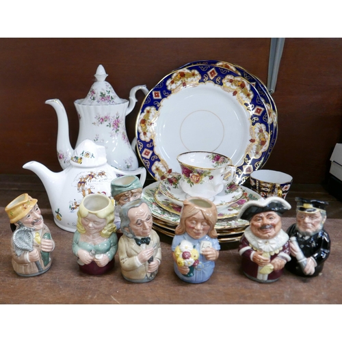 2070 - A collection of Royal Albert, Royal Crown Derby and Royal Doulton; seven The Doultonville collection... 