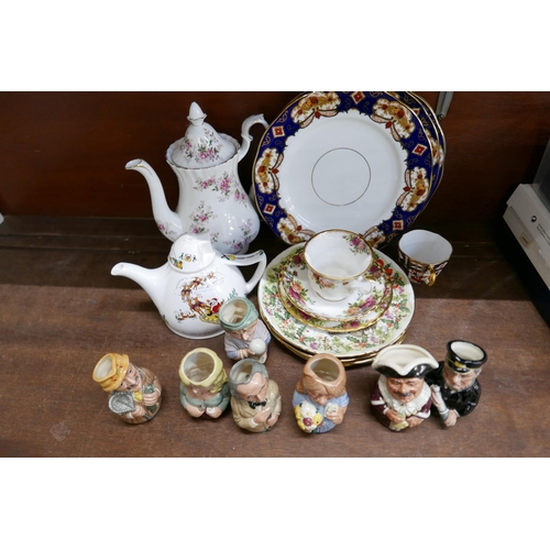 2070 - A collection of Royal Albert, Royal Crown Derby and Royal Doulton; seven The Doultonville collection... 