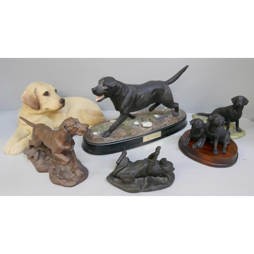 2075 - A collection of dog figures including a Royal Doulton labrador (6)