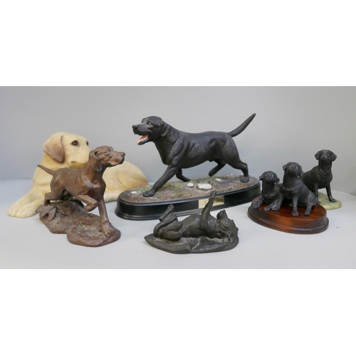 2075 - A collection of dog figures including a Royal Doulton labrador (6)