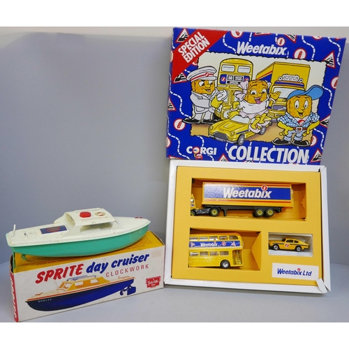 2081 - A Sutcliffe Toy model Sprite 'day cruiser' clockwork boat and a Corgi Collection Weetabix set