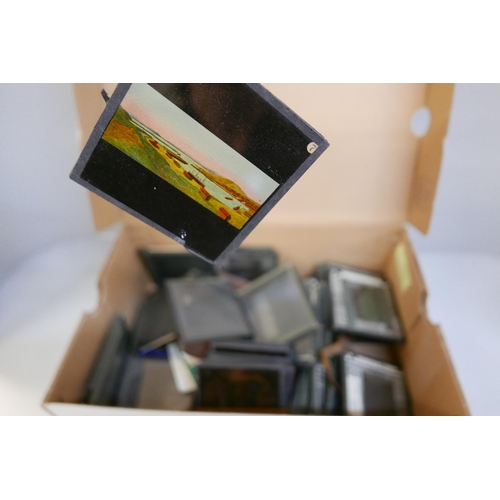 2099 - A box of lantern slides, mainly black and white scenic views but also some coloured