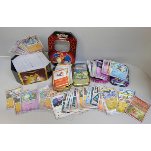 2100 - 500+ Pokémon cards and collectors tins, including holographic