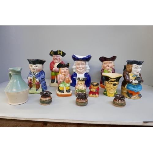 2108 - A collection of nine Toby jugs and other pottery