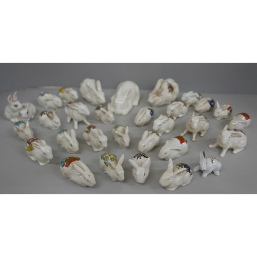 2113 - A collection of china rabbits including Belleek, crested china, Longton china, etc., approximately 3... 