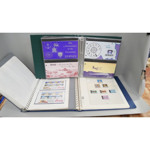 2130 - Three albums of Jersey stamps, printed album of booklet panes, album of presentation packs and mint ... 