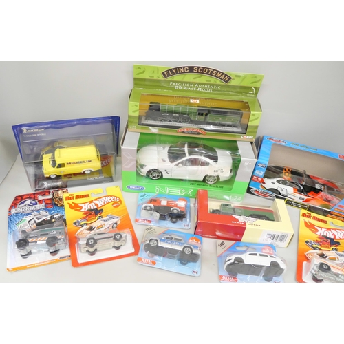 2136 - A collection of die-cast vehicles including a Corgi Flying Scotsman, Nex car, Michelin van, Jurassic... 