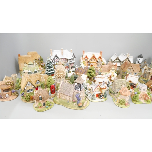 2137 - A collection of Christmas Lilliput Lane cottages, other Lilliput Lane houses and shops with deeds