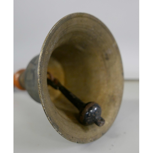 2309 - A WWII brass handbell with large broad arrow