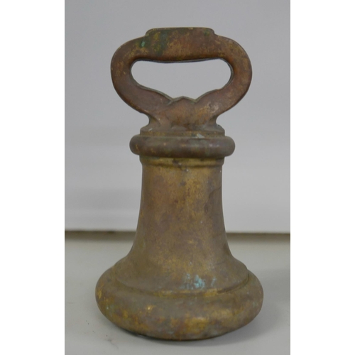 2310 - An early 20th century 50 Troy ounce brass bell weight