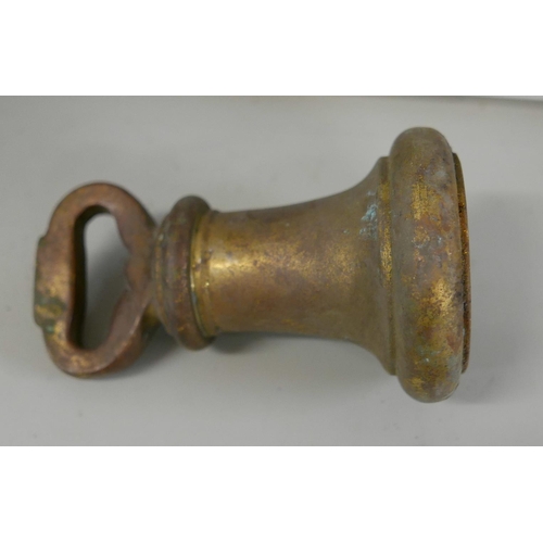 2310 - An early 20th century 50 Troy ounce brass bell weight