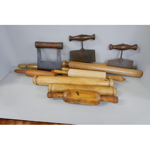 2315 - A collection of wooden rolling pins and herb/pastry cutters