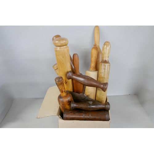 2315 - A collection of wooden rolling pins and herb/pastry cutters