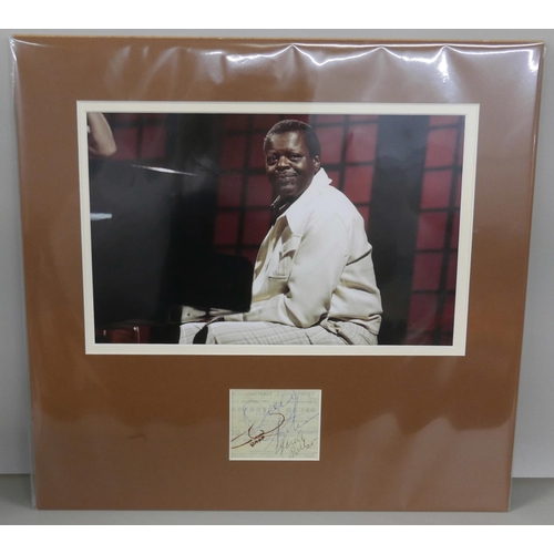 2324 - An Oscar Peterson (jazz pianist) signed ticket display