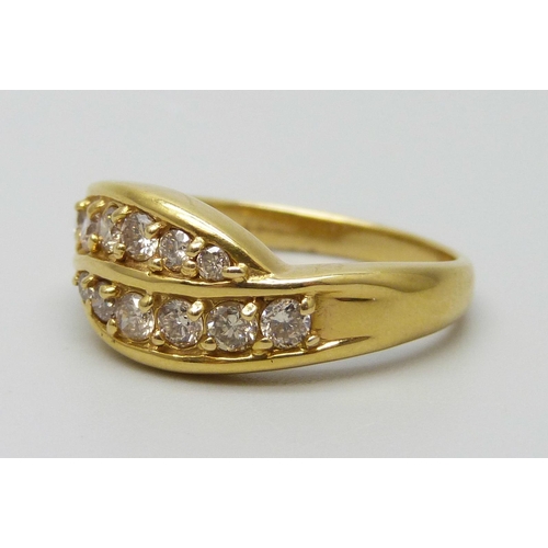 7007 - An 18ct gold and diamond ring, 0.6 carat of brilliant cut diamonds, 5.1g, N/O