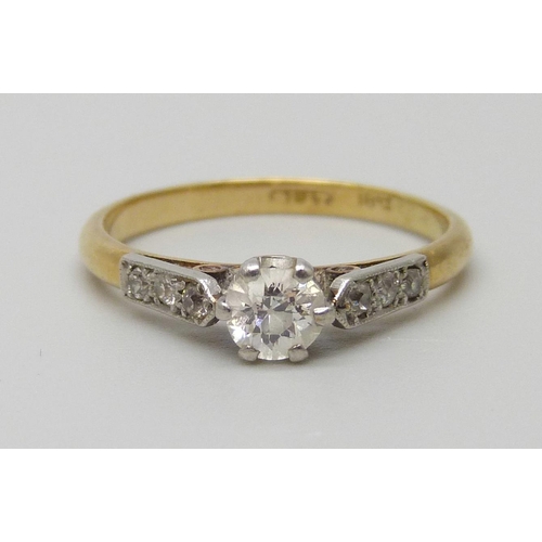 7021 - An 18ct gold platinum set diamond ring, 2.3g, L