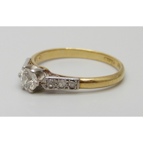 7021 - An 18ct gold platinum set diamond ring, 2.3g, L