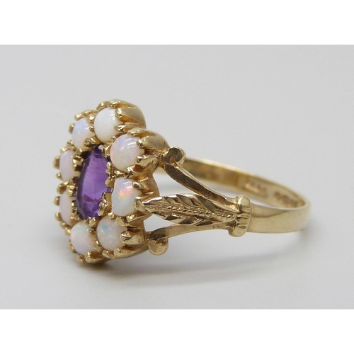 7039 - A 9ct gold, opal and amethyst ring, 2.3g, N