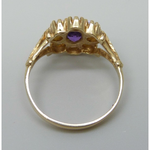 7039 - A 9ct gold, opal and amethyst ring, 2.3g, N