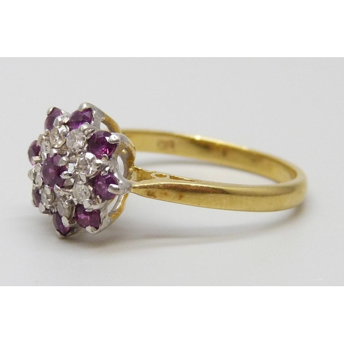 7041 - An 18ct gold, diamond and ruby ring, 3.8g, O