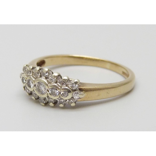 7042 - A 9ct gold and diamond ring, one stone missing, 2.4g, L