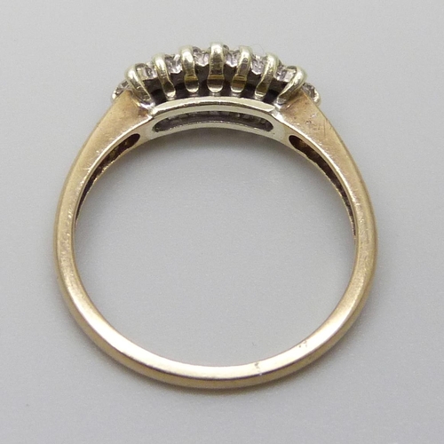 7042 - A 9ct gold and diamond ring, one stone missing, 2.4g, L