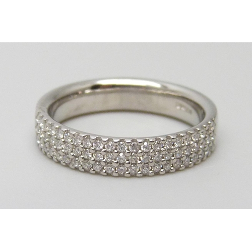 7043 - A platinum three row multi diamond set ring, 5.1g, I