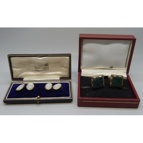 7048 - A pair of mother of pearl set cufflinks and two green stone set cufflinks/buttons