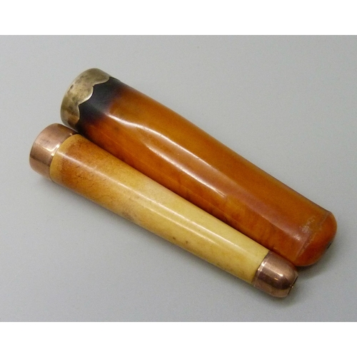 7053 - A 9ct gold mounted cigarette holder, London 1901 and a similar butterscotch amber example with silve... 