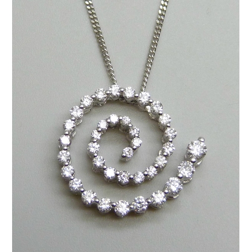 7058 - An 18ct white gold and diamond pendant and 18ct white gold chain, 4.8g, chain 43cm