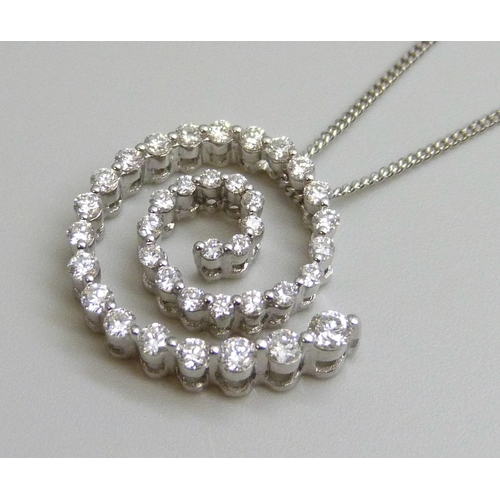 7058 - An 18ct white gold and diamond pendant and 18ct white gold chain, 4.8g, chain 43cm