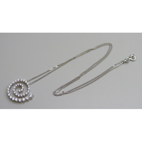 7058 - An 18ct white gold and diamond pendant and 18ct white gold chain, 4.8g, chain 43cm