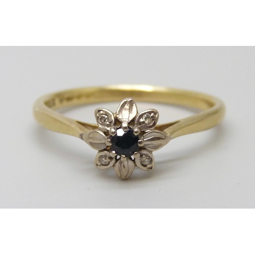 7060 - An 18ct gold, diamond and sapphire ring, 2.7g, P