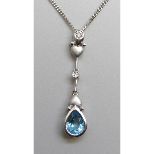 7066 - An 18ct white gold, topaz and diamond pendant and 18ct white gold chain, 4.9g, chain 45cm