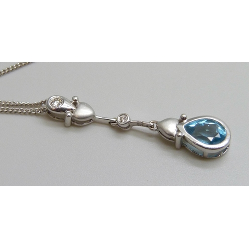 7066 - An 18ct white gold, topaz and diamond pendant and 18ct white gold chain, 4.9g, chain 45cm