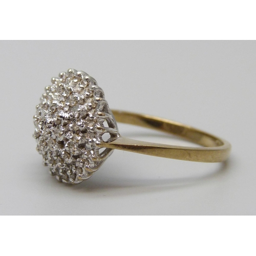 7070 - A 9ct gold and diamond ring, 2.8g, O