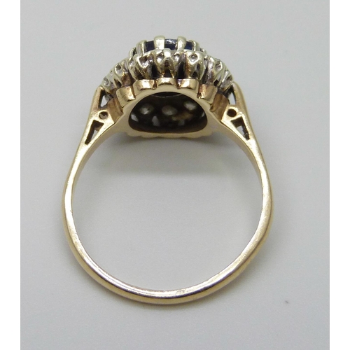 7072 - A 9ct gold, diamond and sapphire ring, 3.5g, N/O