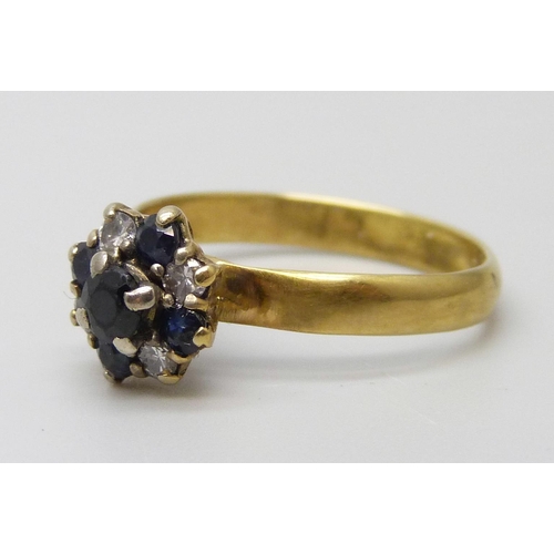 7079 - A yellow metal sapphire and diamond ring, 2.4g, N