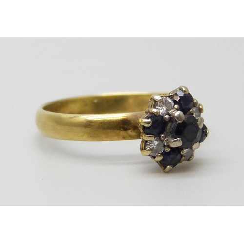 7079 - A yellow metal sapphire and diamond ring, 2.4g, N