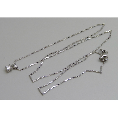 7080 - A single stone diamond pendant on a platinum chain, 5.3g, chain 44cm