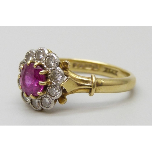 7084 - An 18ct gold, ruby and diamond cluster ring, 4g, O