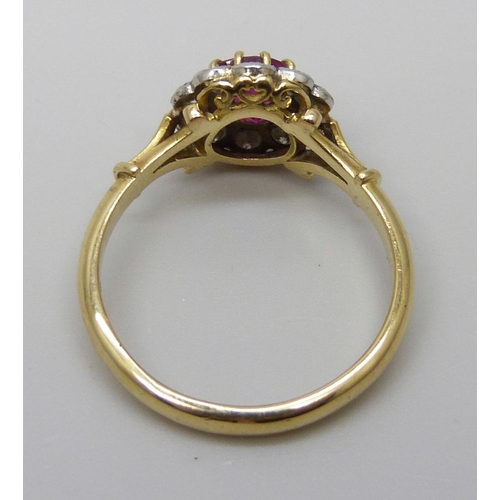 7084 - An 18ct gold, ruby and diamond cluster ring, 4g, O