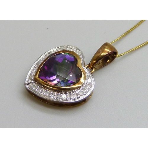 7085 - A 9ct gold, mystic topaz and diamond pendant and chain, 2g, chain 44cm