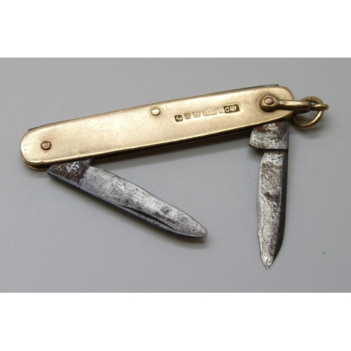 7090 - A 9ct gold mounted pocket knife, Birmingham 1903, 57mm without loop