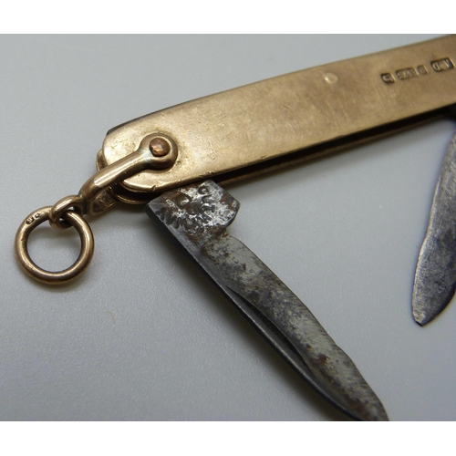 7090 - A 9ct gold mounted pocket knife, Birmingham 1903, 57mm without loop