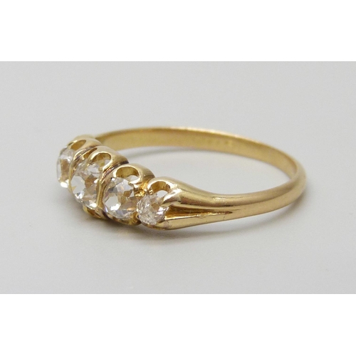 7091 - A Victorian yellow metal ring set with five old cut diamonds, 1.9g, J/K