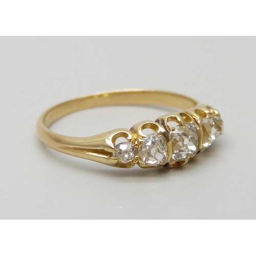 7091 - A Victorian yellow metal ring set with five old cut diamonds, 1.9g, J/K