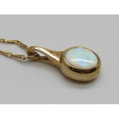 7099 - A 9ct gold and opal pendant and chain, 3.9g, chain 50cm, boxed