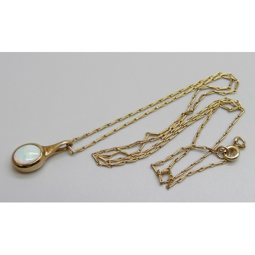 7099 - A 9ct gold and opal pendant and chain, 3.9g, chain 50cm, boxed